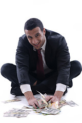 Image showing Business man holding money