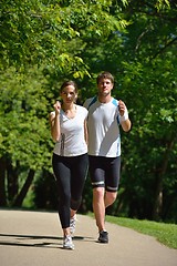 Image showing Young couple jogging