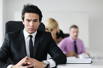 Image showing young business man at meeting