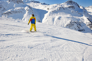 Image showing skiing on fresh snow at winter season at beautiful sunny day