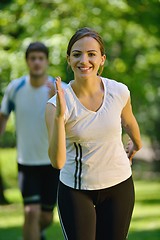 Image showing Young couple jogging