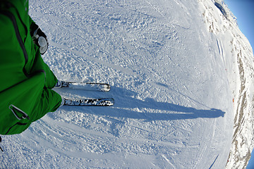 Image showing skiing on fresh snow at winter season at beautiful sunny day