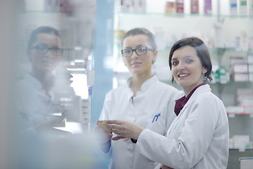 Image showing team of pharmacist chemist woman  in pharmacy drugstore