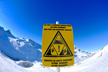 Image showing Sign board at High mountains under snow in the winter