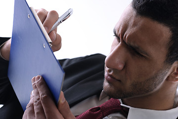 Image showing business man trying to read