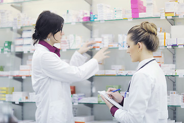 Image showing team of pharmacist chemist woman  in pharmacy drugstore