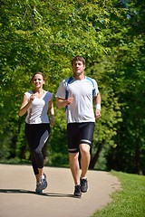 Image showing Young couple jogging at morning