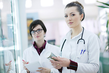 Image showing team of pharmacist chemist woman  in pharmacy drugstore