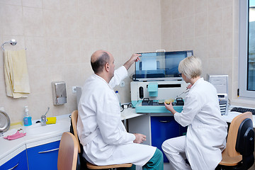 Image showing veterinarian and assistant in a small animal clinic