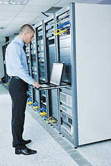 Image showing young it engineer in datacenter server room