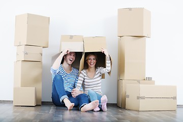 Image showing Young couple moving in new house