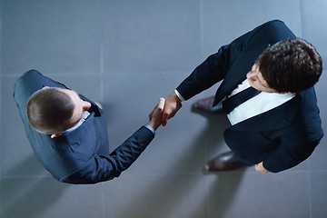 Image showing business people making deal