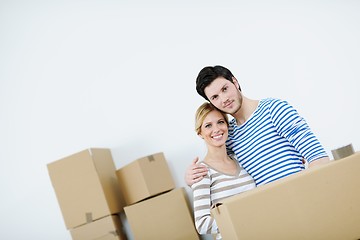 Image showing Young couple moving in new house