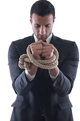 Image showing business man with rope isolated on white background