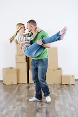 Image showing Young couple moving in new house