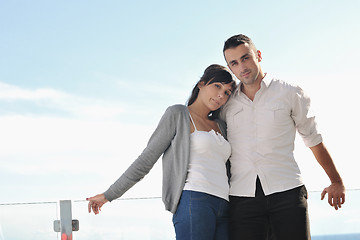 Image showing couple relaxing on balcony