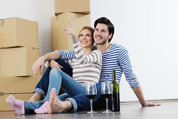 Image showing Young couple moving in new house