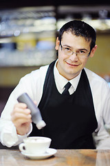 Image showing Barista prepares cappuccino