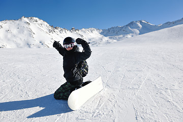 Image showing skiing on fresh snow at winter season at beautiful sunny day