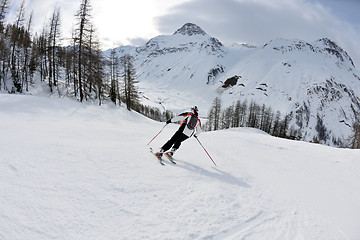 Image showing skiing on fresh snow at winter season at beautiful sunny day