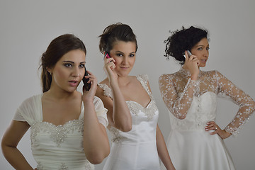 Image showing portrait of a three beautiful woman in wedding dress