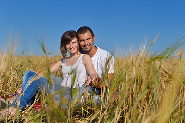 Image showing happy couple in wheat field