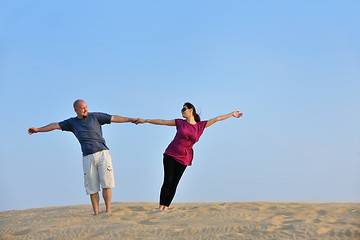 Image showing couple enjoying the sunset