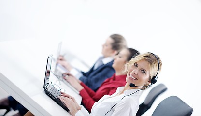 Image showing business woman group with headphones