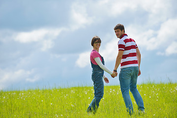 Image showing romantic young couple in love together outdoor