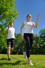 Image showing Young couple jogging at morning