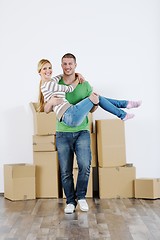 Image showing Young couple moving in new house