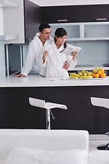 Image showing young couple have fun in modern kitchen