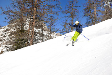 Image showing skiing on fresh snow at winter season at beautiful sunny day