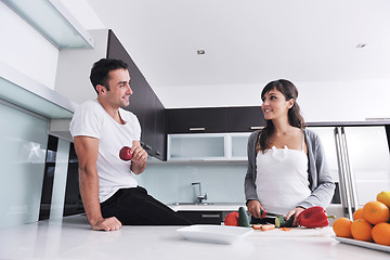 Image showing young couple have fun in modern kitchen