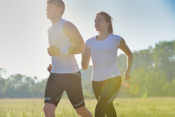 Image showing Young couple jogging at morning