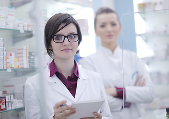 Image showing team of pharmacist chemist woman  in pharmacy drugstore