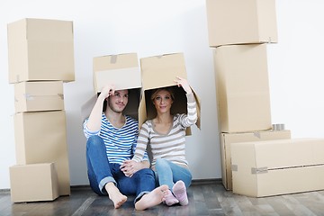 Image showing Young couple moving in new house