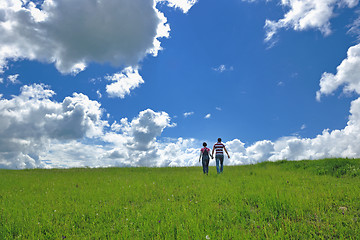 Image showing Portrait of romantic young couple smiling together outdoor