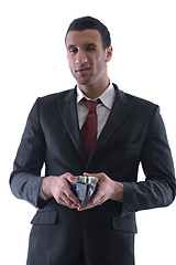 Image showing Business man holding money