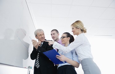 Image showing Senior business man giving a presentation