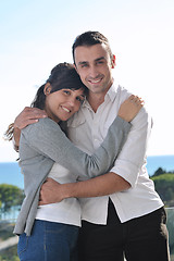 Image showing couple relaxing on balcony