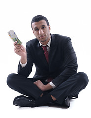 Image showing Business man holding money