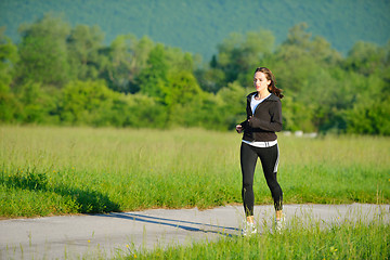 Image showing Young couple jogging