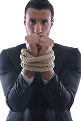 Image showing business man with rope isolated on white background