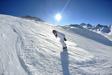 Image showing skiing on fresh snow at winter season at beautiful sunny day