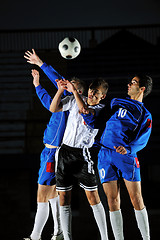 Image showing football players in action for the ball