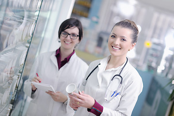 Image showing team of pharmacist chemist woman  in pharmacy drugstore