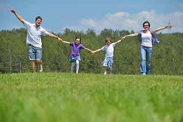 Image showing happy young family have fun outdoors