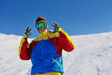 Image showing skiing on fresh snow at winter season at beautiful sunny day