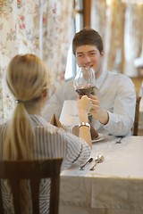 Image showing young couple having dinner at a restaurant